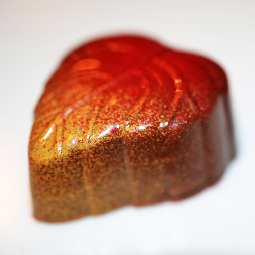 A bonbon decorated with an airbrush